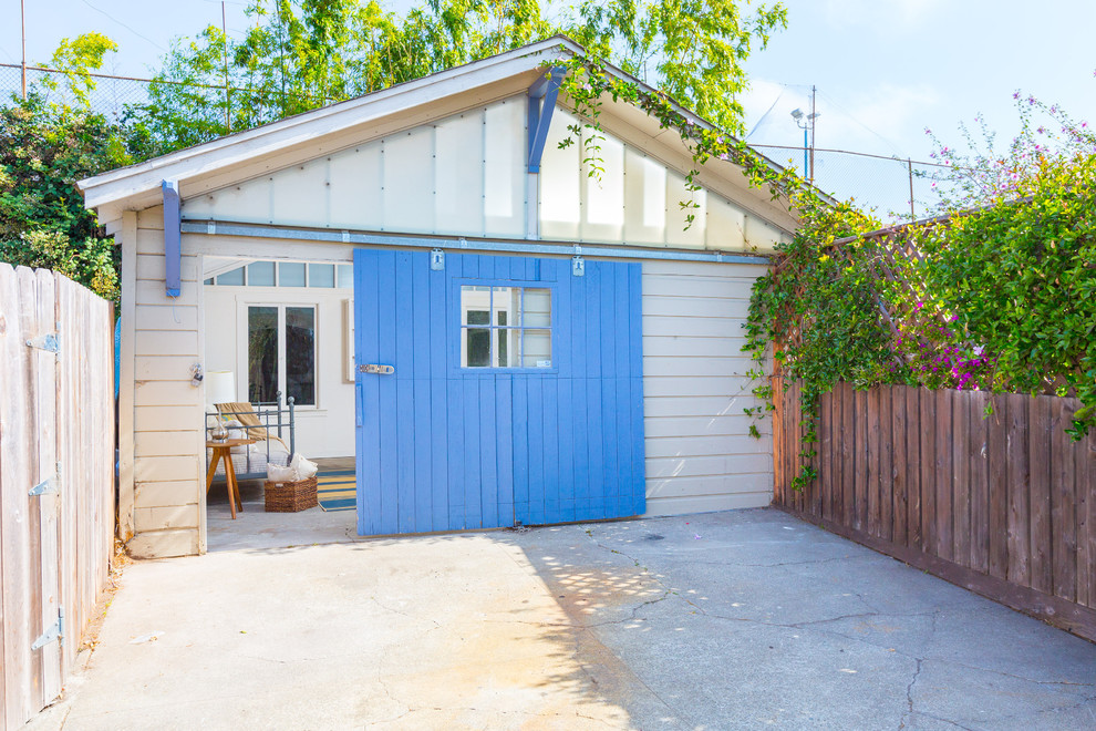 Aménagement d'un garage pour deux voitures séparé campagne.