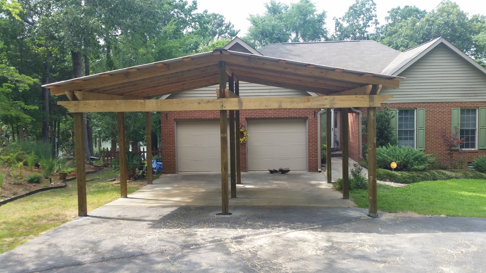 Mid-sized detached two-car carport photo in Other