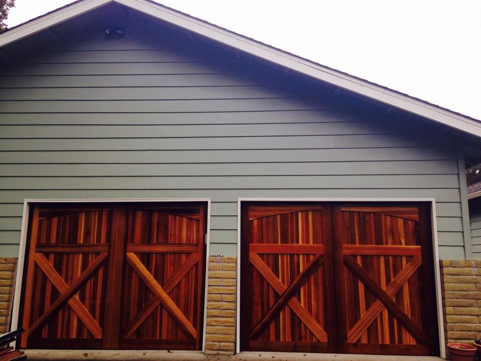Wood Doors Traditional Garage Other by Bunnell's Overhead Door