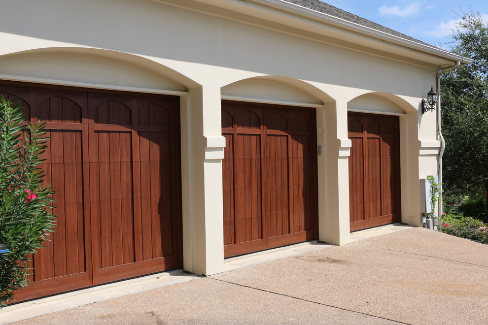 Woodfree custombuilt overhead garage doors Mediterranean Garage Austin by Cedar Park