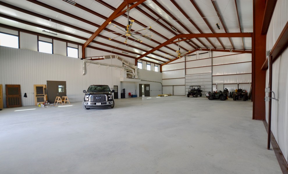 Garage - huge industrial attached garage idea in Austin