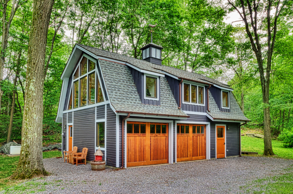 Garage workshop - cottage detached two-car garage workshop idea in New York