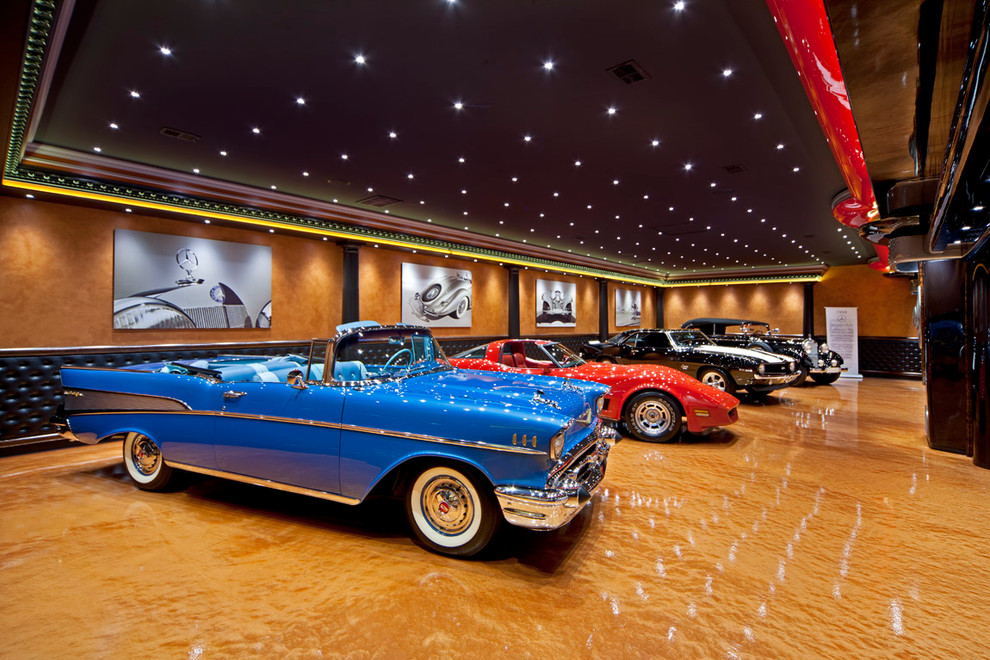Garage - eclectic four-car garage idea in Charlotte