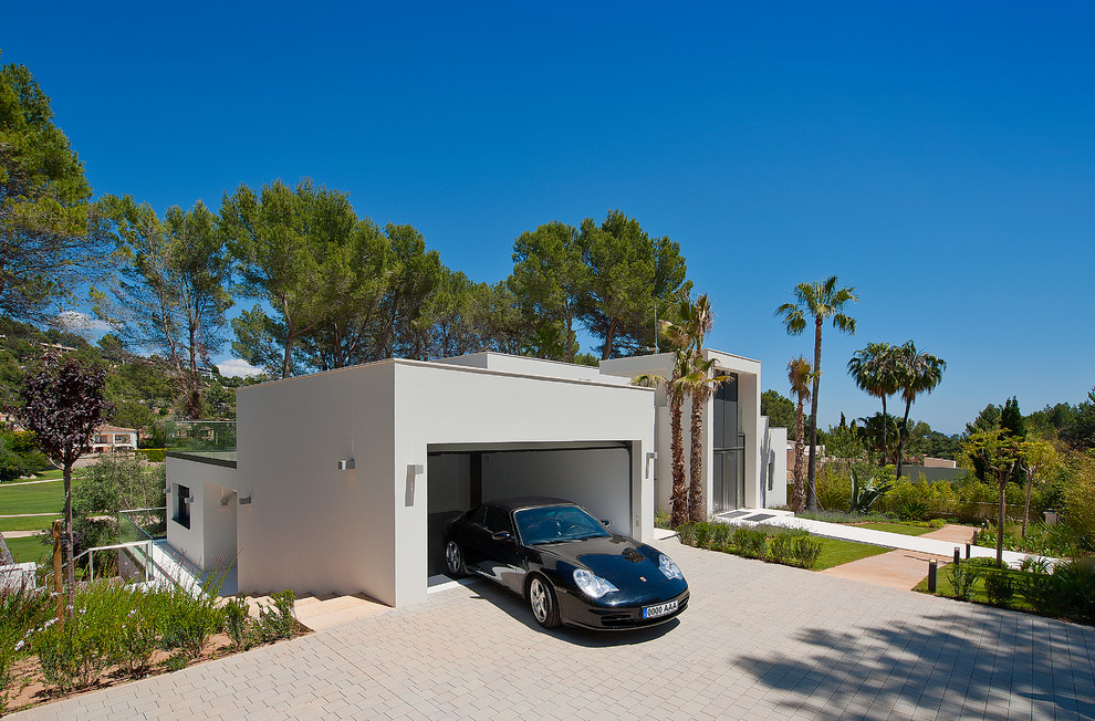 Garage - mediterranean attached garage idea in Palma de Mallorca