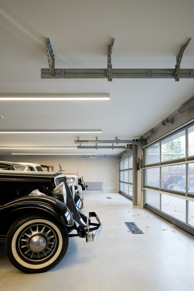 Imagen de garaje independiente actual para tres coches