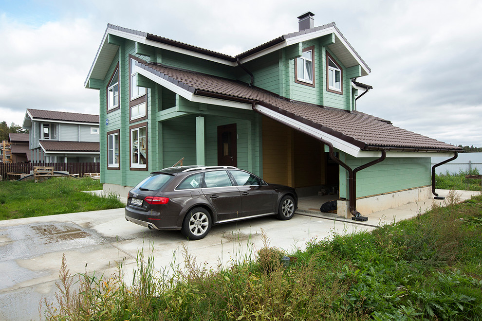 Источник вдохновения для домашнего уюта: пристроенный гараж в стиле кантри для одной машины
