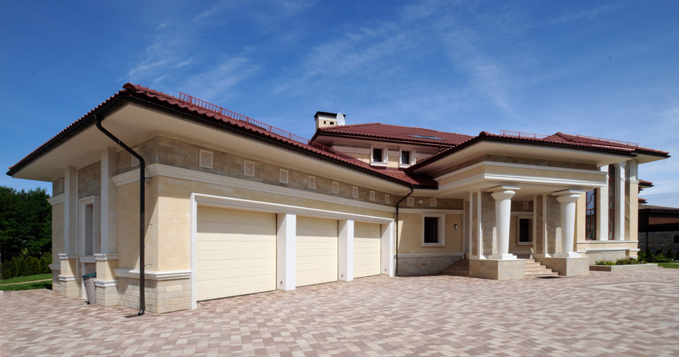 Expansive mediterranean attached garage with three or more cars.