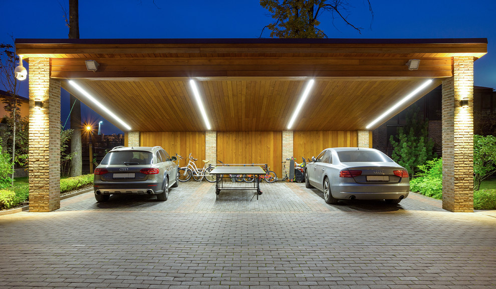Источник вдохновения для домашнего уюта: отдельно стоящий гараж среднего размера в современном стиле с навесом для автомобилей для трех машин