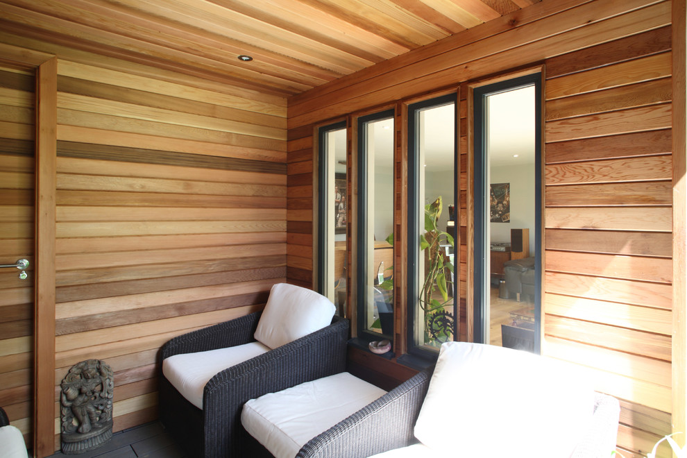This is an example of a contemporary garden shed and building in Surrey.
