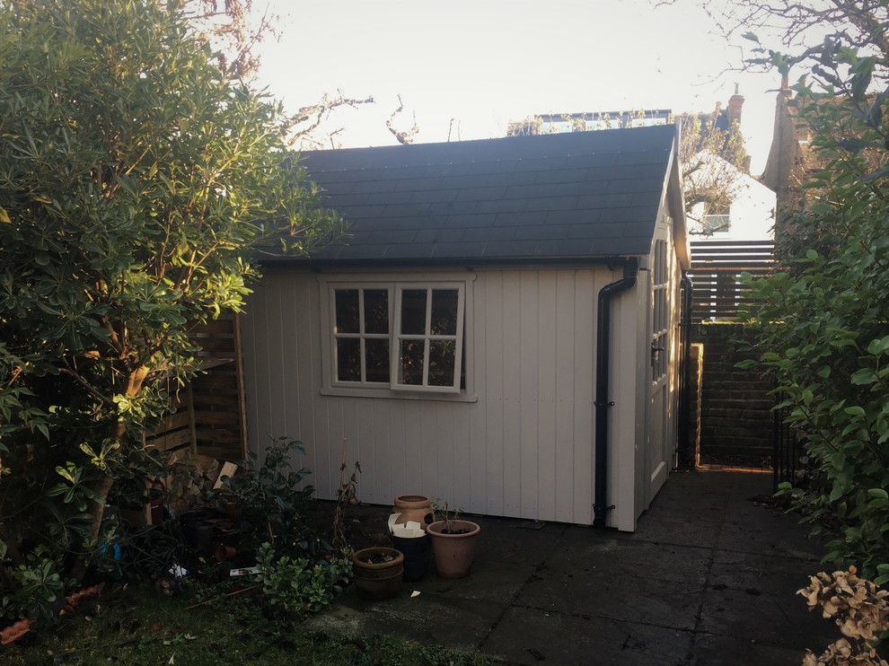 This is an example of a large modern detached garden shed in London.