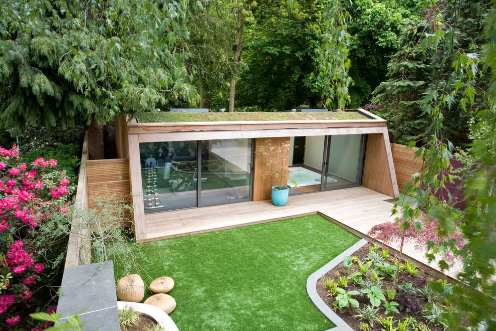 Photo of a contemporary garden shed and building in London.