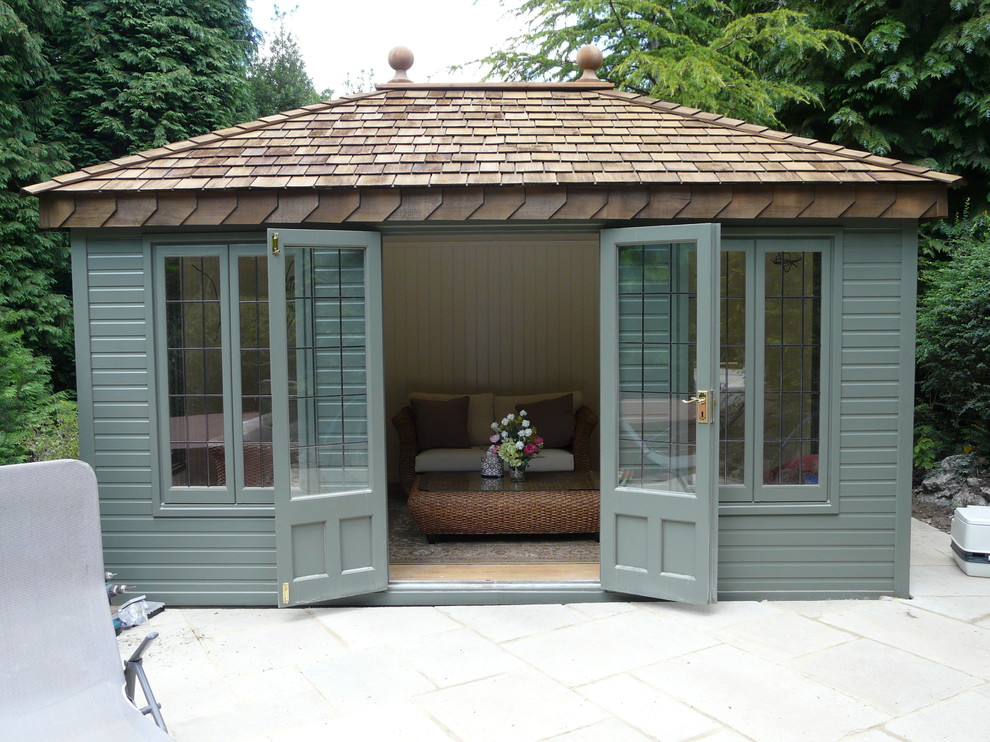 Photo of a contemporary garden shed and building in Surrey.