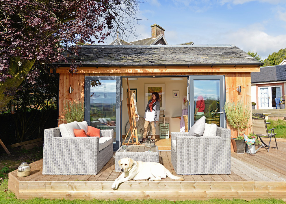 Inspiration for a mid-sized eclectic shed remodel in Other