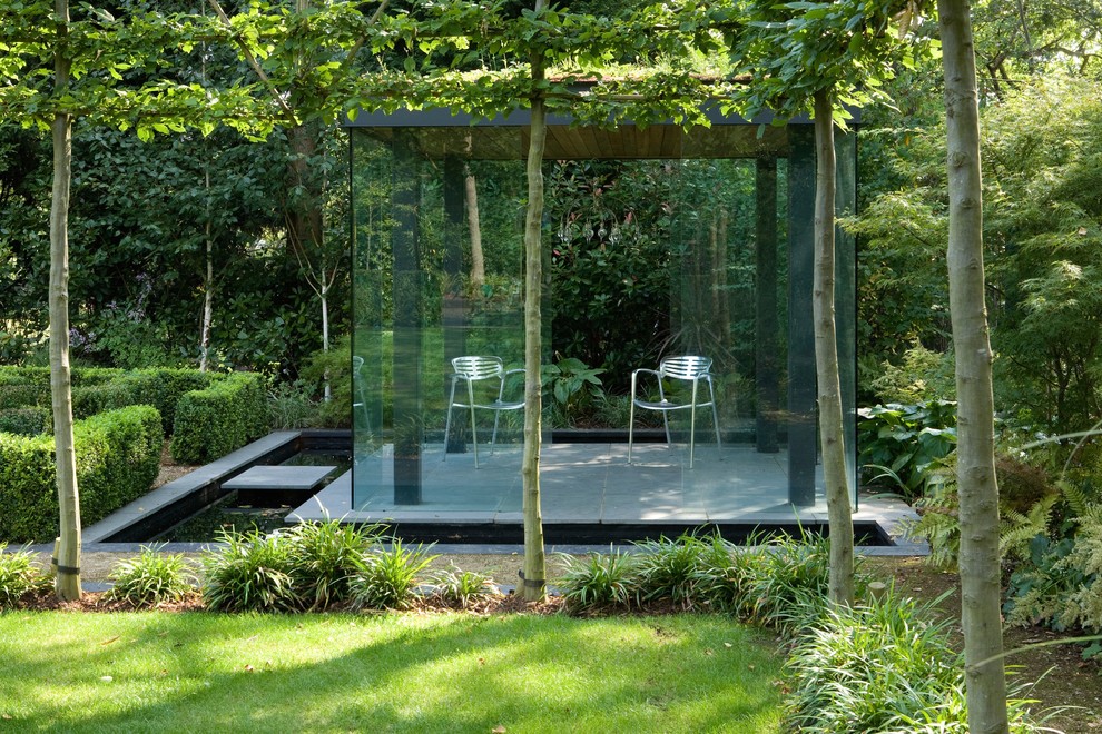 Idées déco pour un petit abri de jardin séparé contemporain.