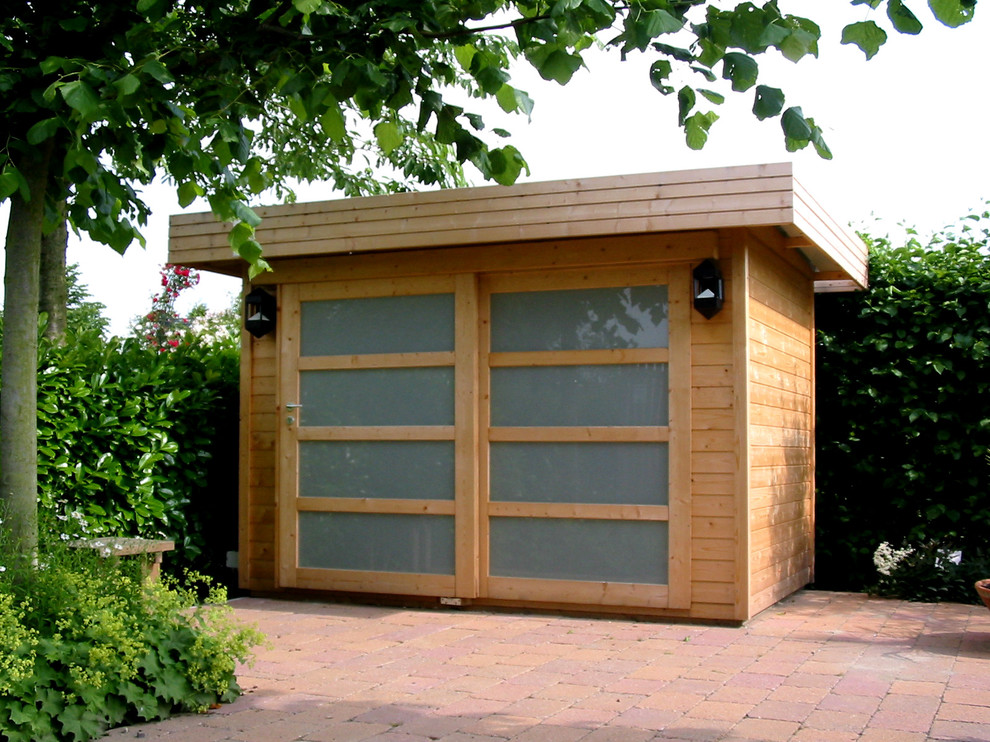 Example of a small trendy detached garden shed design in Wiltshire