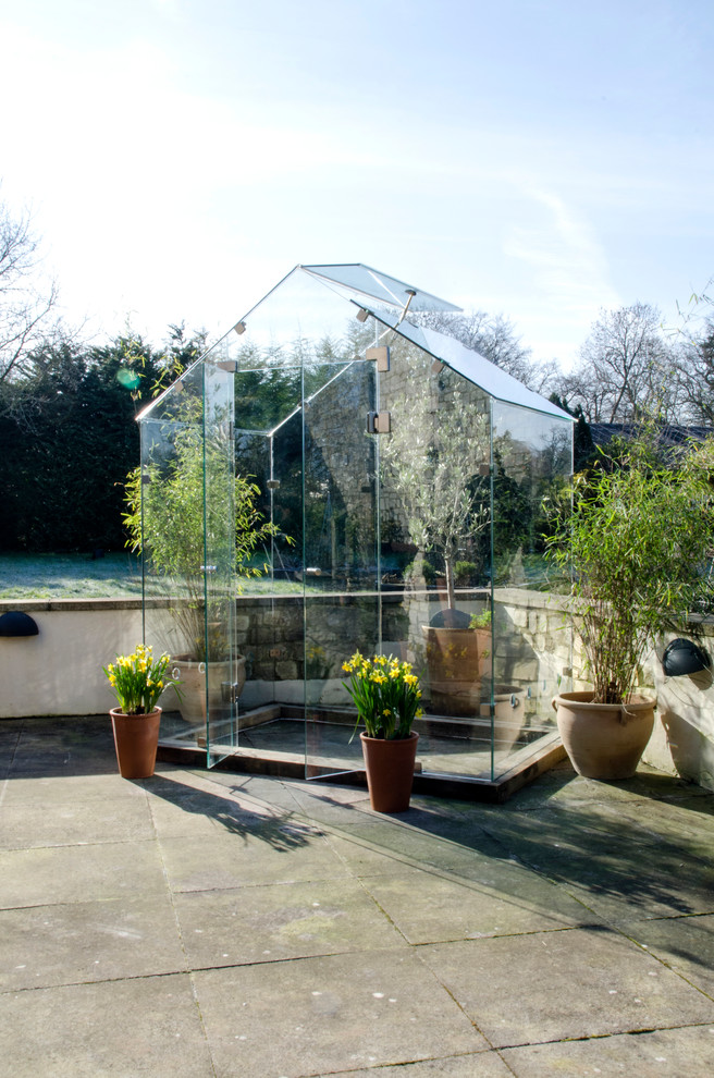 Design ideas for a small contemporary detached greenhouse in Other.