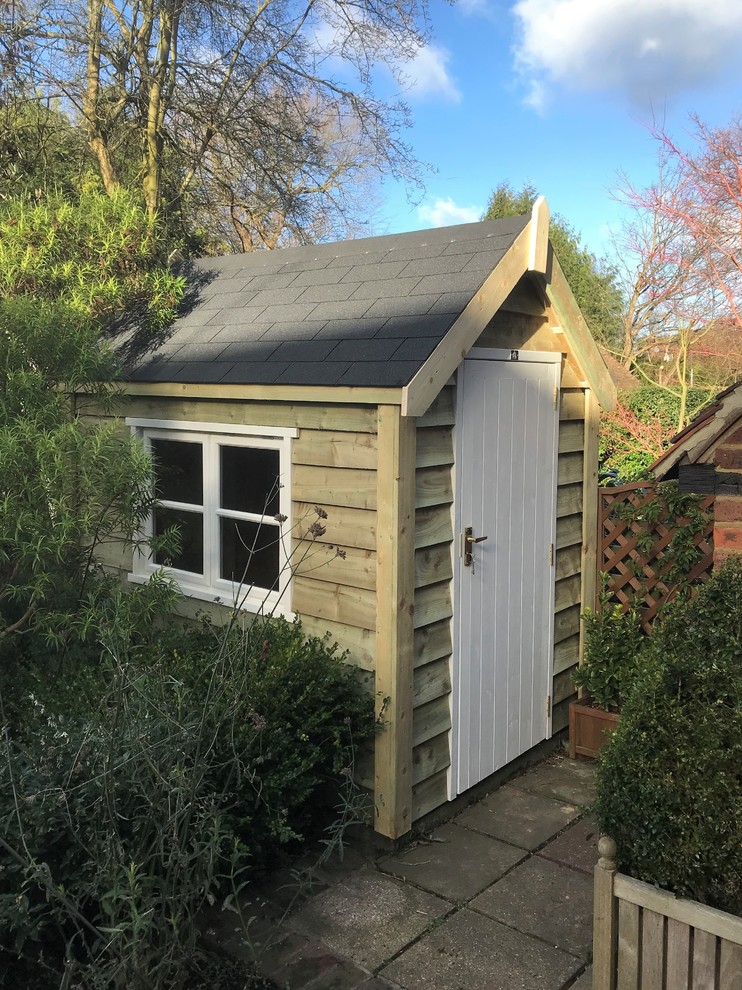 Inspiration for a medium sized classic detached garden shed in London.