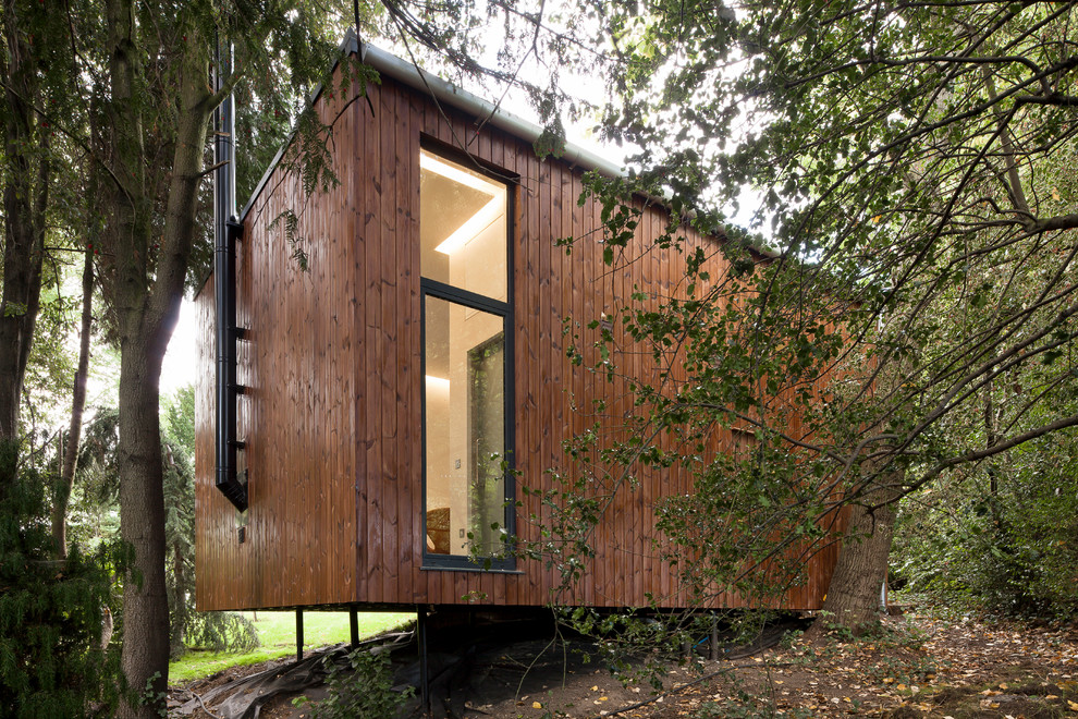 Photo of a contemporary garden shed and building in London.