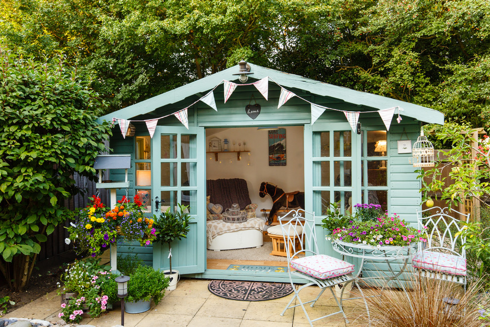 Inspiration for a shabby-chic style detached studio / workshop shed remodel in Cambridgeshire