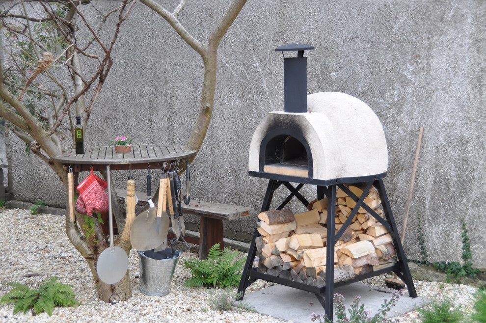 A base was constructed for the pizza oven to stand on Modern Garden