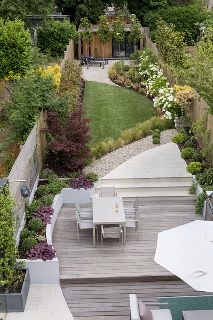 A contemporary curved designer garden - Moderno - Giardino - Londra ...