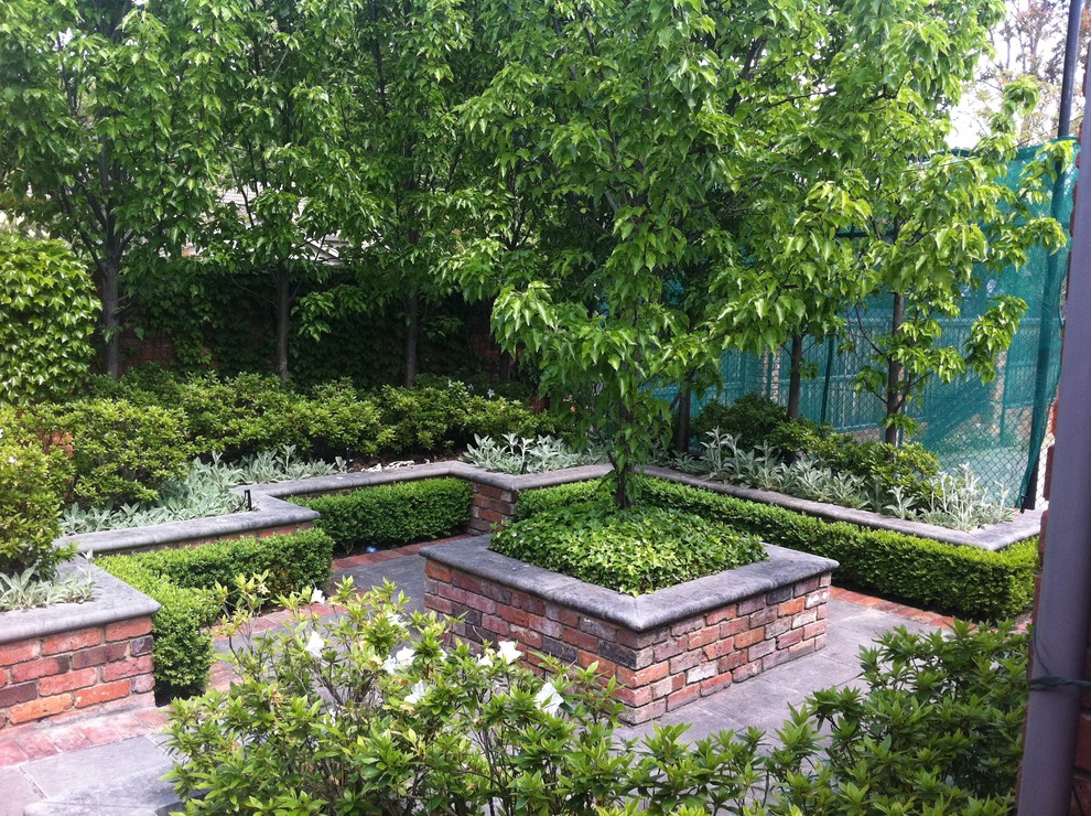 Design ideas for a small classic back formal garden in Melbourne.