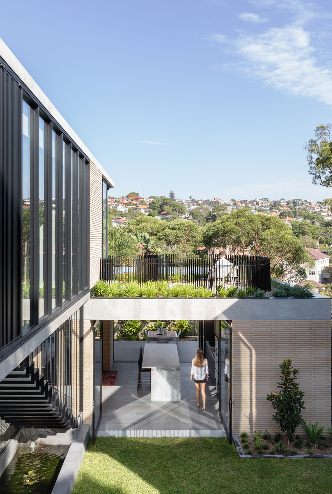 This is an example of a mid-sized contemporary rooftop landscaping in Sydney.