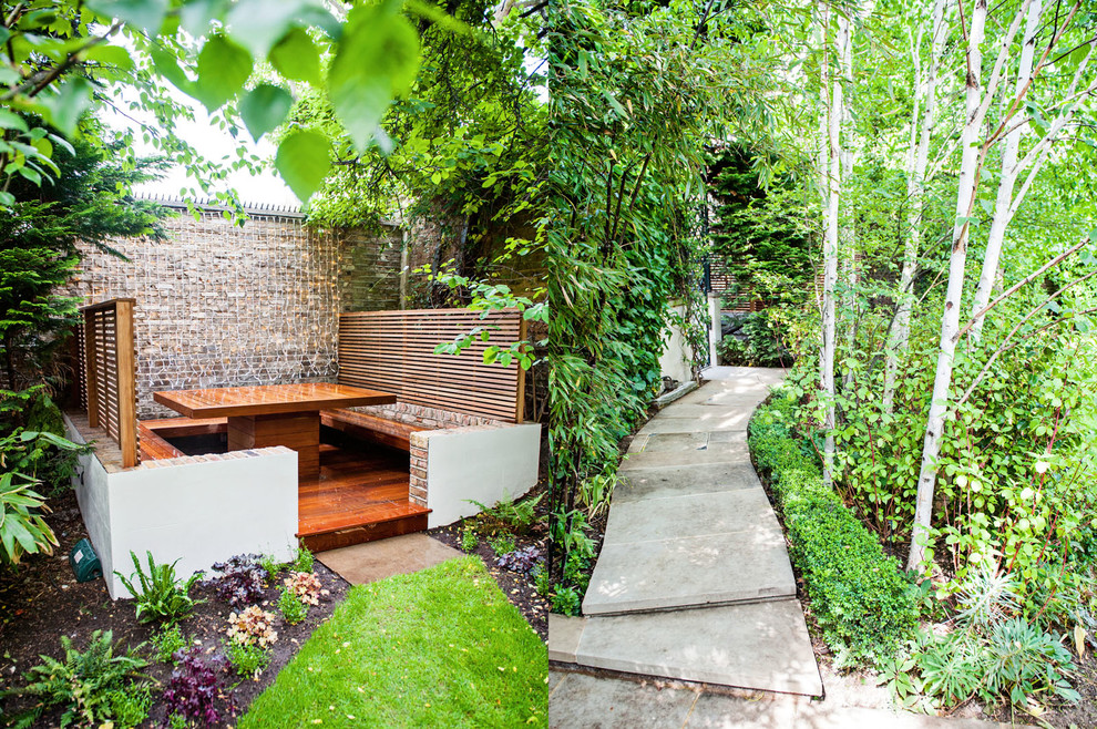 Schattiger Moderner Gartenweg mit Natursteinplatten in London