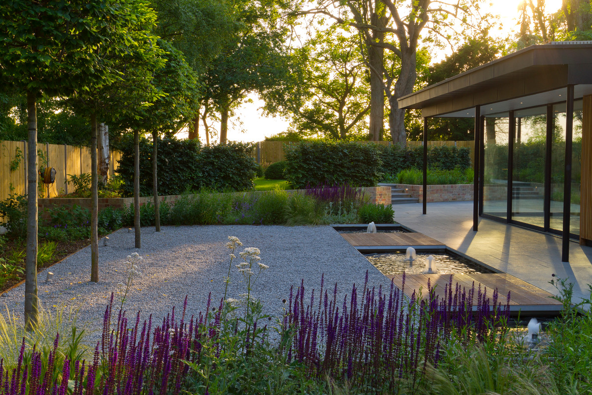 Design ideas for a medium sized contemporary garden in Cambridgeshire.