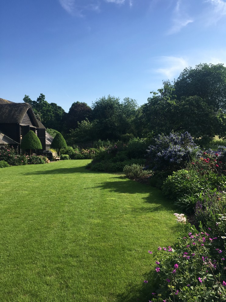 Design ideas for a farmhouse garden in Sussex.