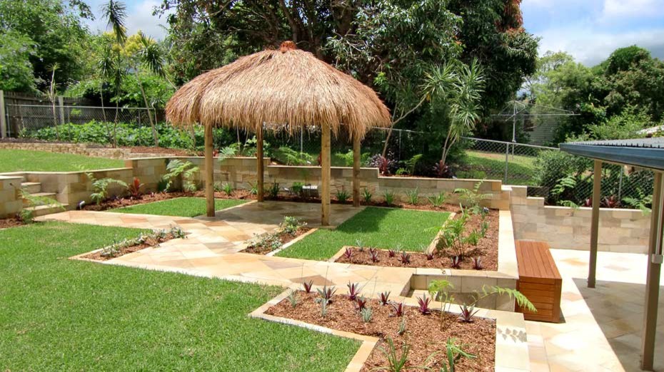 This is an example of a mid-sized tropical full sun backyard stone outdoor sport court in Brisbane for summer.