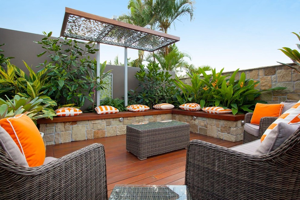 Photo of a medium sized modern back garden in Brisbane with decking.