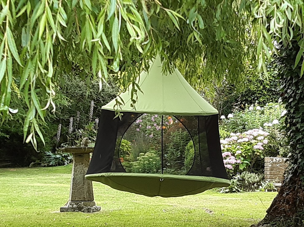 Idee per un giardino country in ombra di medie dimensioni e dietro casa in estate con un focolare