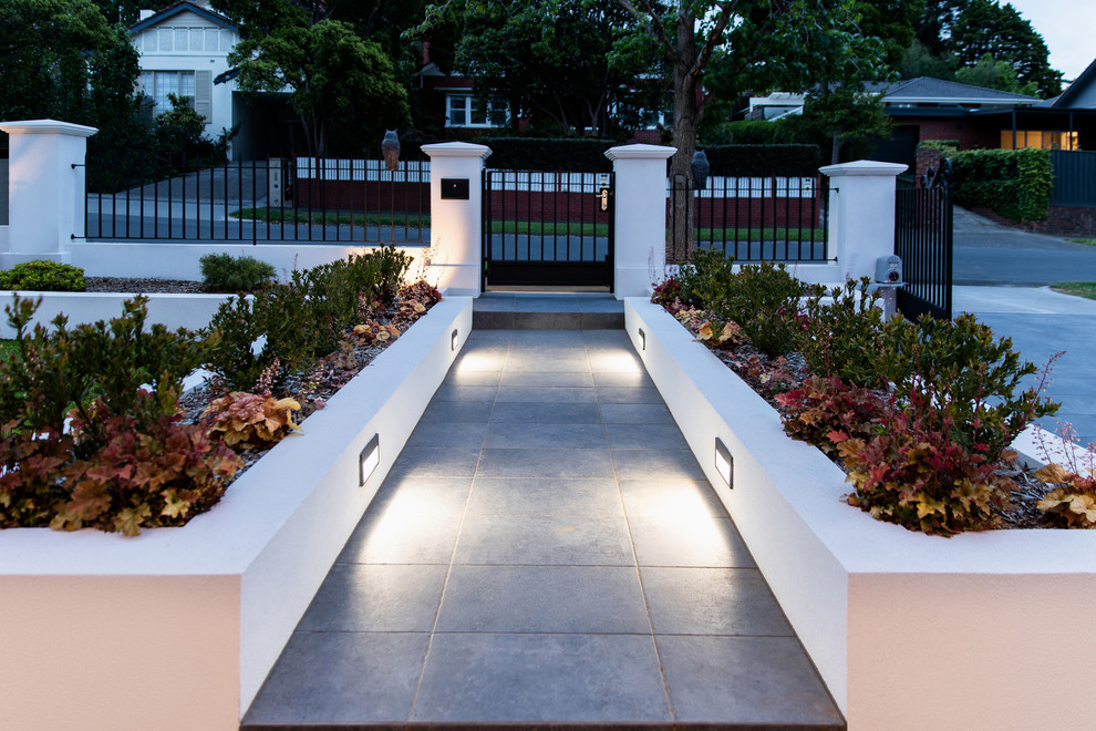 This is an example of a large contemporary landscaping in Melbourne.