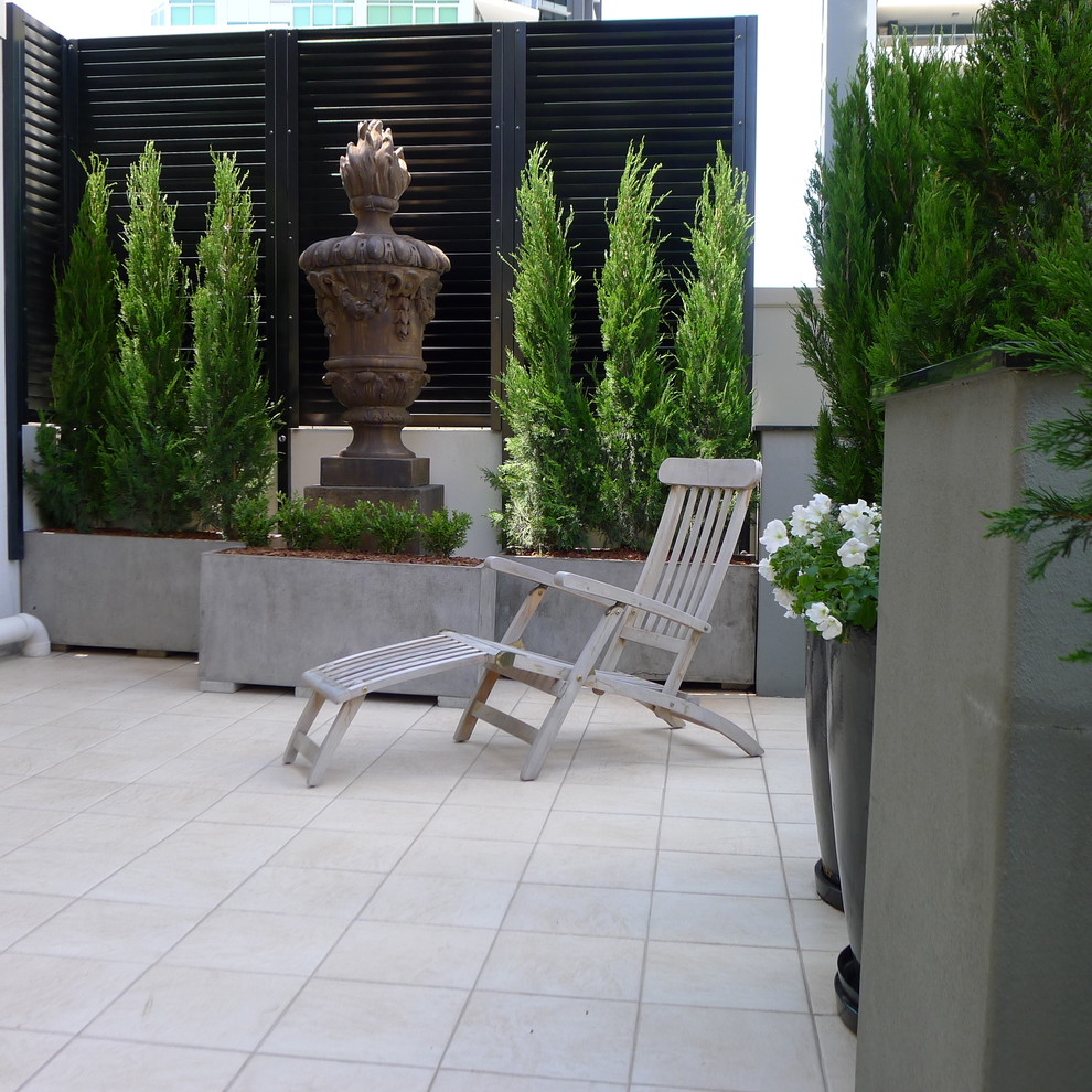 Idee per un giardino chic esposto a mezz'ombra sul tetto in estate con un giardino in vaso