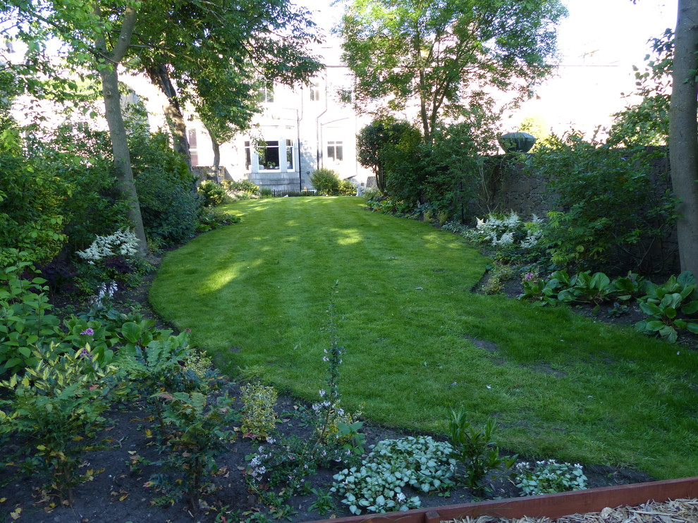 Photo of a medium sized traditional garden in Other.