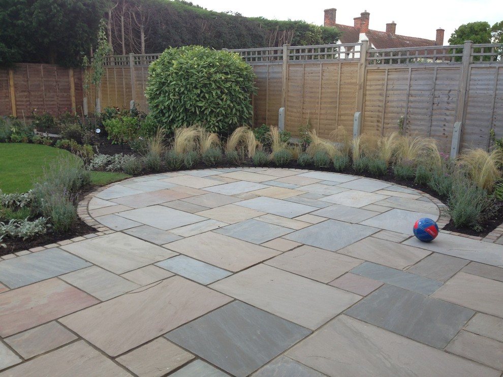 This is an example of a medium sized contemporary back formal garden in Devon.