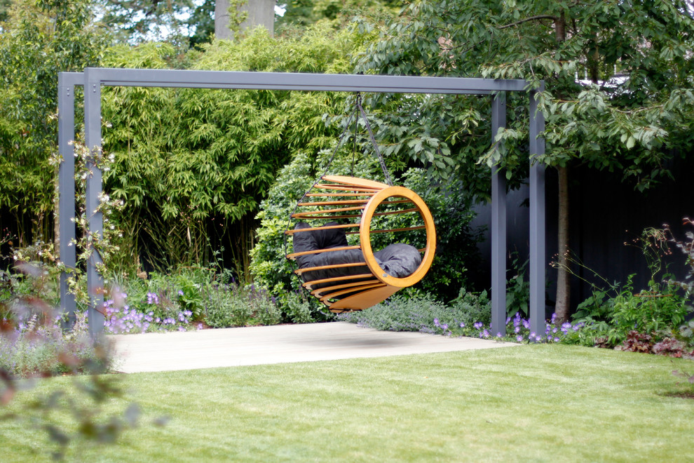 Idee per un giardino formale design esposto a mezz'ombra di medie dimensioni in estate con un focolare