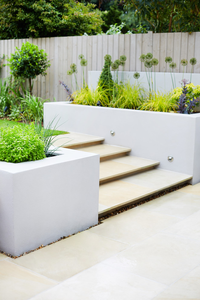 Design ideas for a medium sized contemporary back garden in Cheshire.