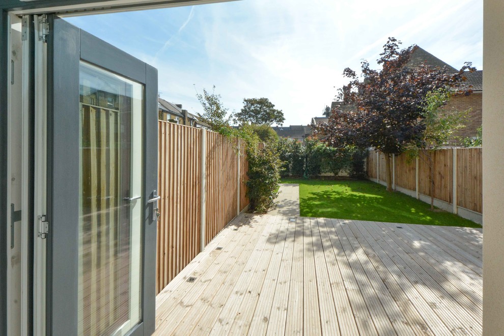 Design ideas for a large contemporary back garden fence in Kent.