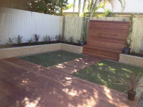 Design ideas for a modern back garden in Sunshine Coast with decking.