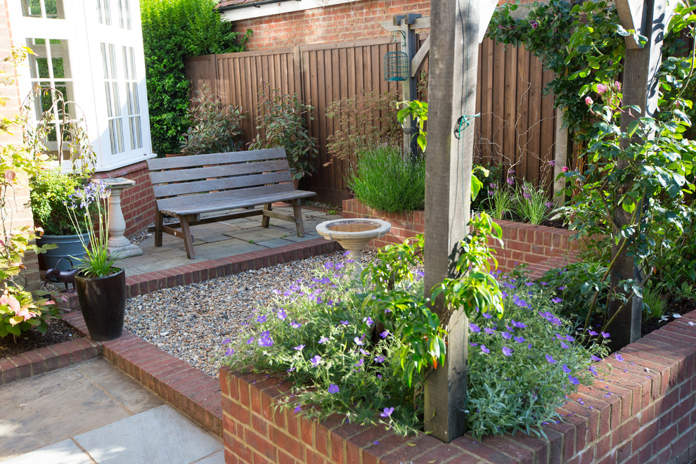 Small classic courtyard formal garden in Cheshire.