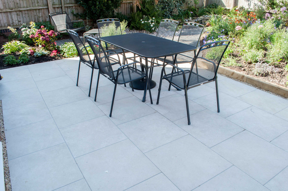 This is an example of a contemporary patio in Gloucestershire.