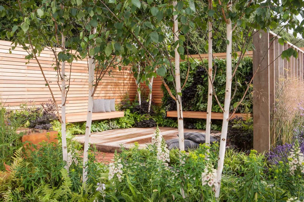 Esempio di un giardino boho chic esposto a mezz'ombra di medie dimensioni e dietro casa in estate