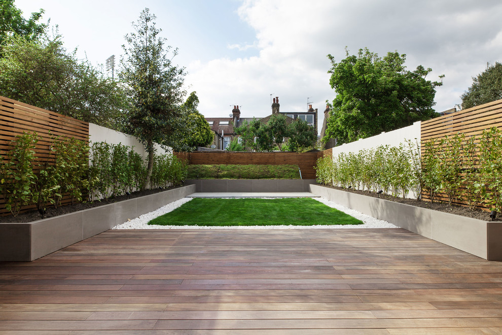 This is an example of a contemporary partial sun garden in London.