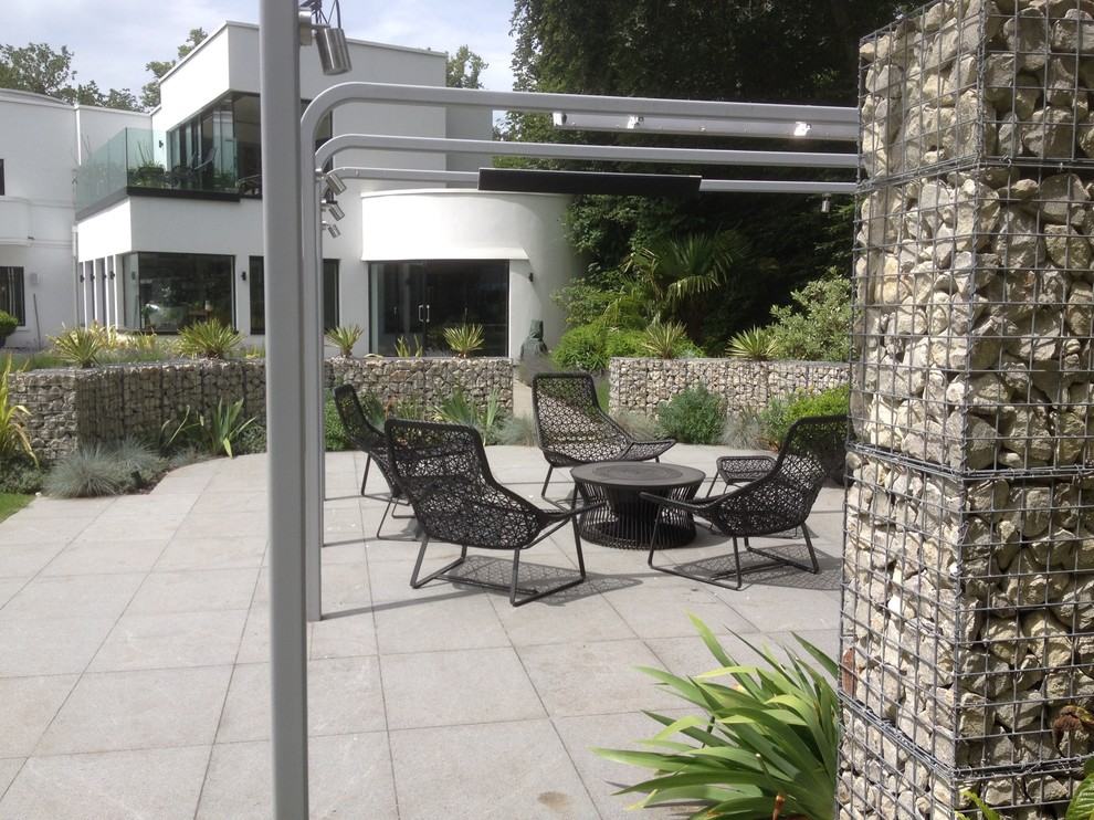 This is an example of a contemporary patio in Devon.