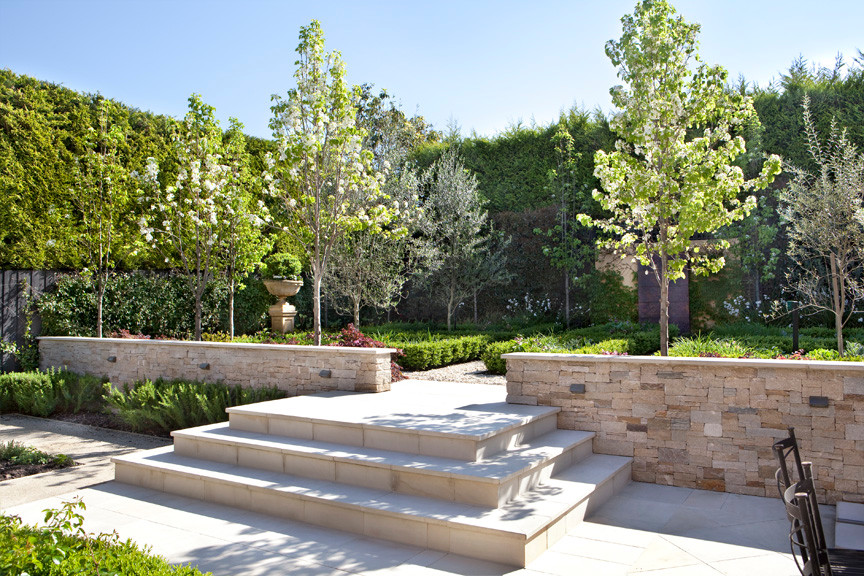 This is an example of a mid-sized traditional backyard formal garden in Melbourne for summer.
