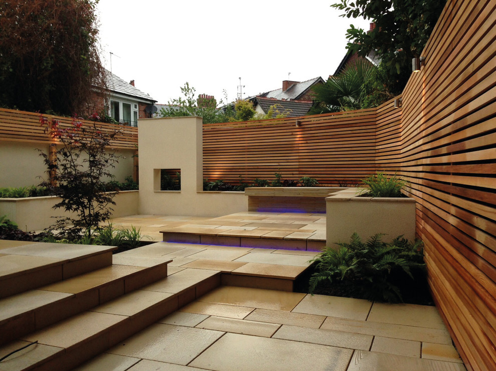 Nautical garden in Other with natural stone paving.