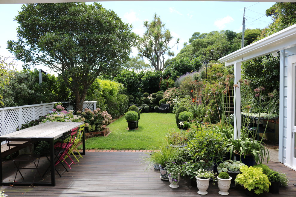 Idee per un giardino minimal di medie dimensioni e dietro casa con pedane