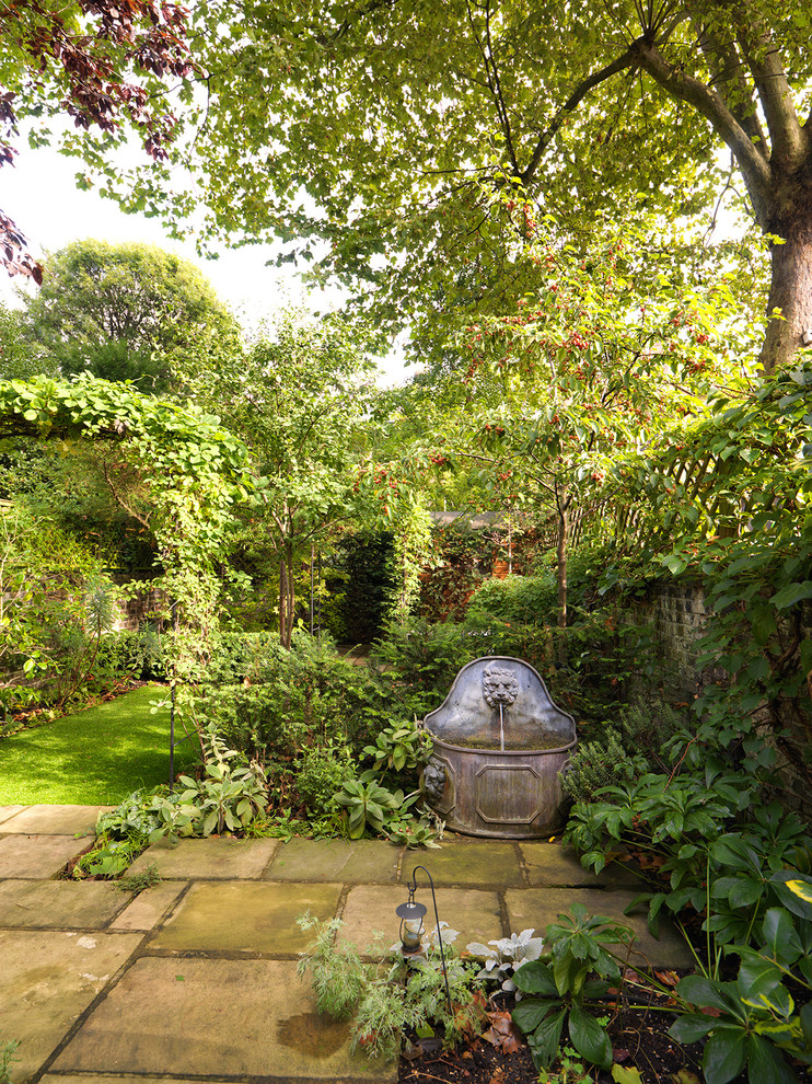 This is an example of a traditional full sun formal garden in London.